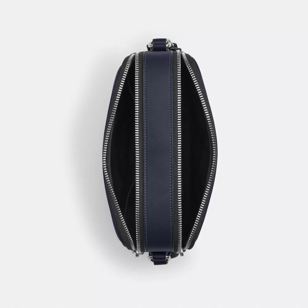Graham-crossbody-veske med kryssrem i karakteristisk kamuflasjeprint