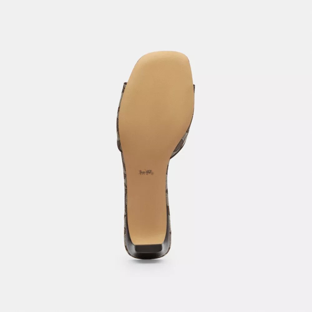 Hælsandaler med sløyfe i vårt karakteristiske jacquardmønster