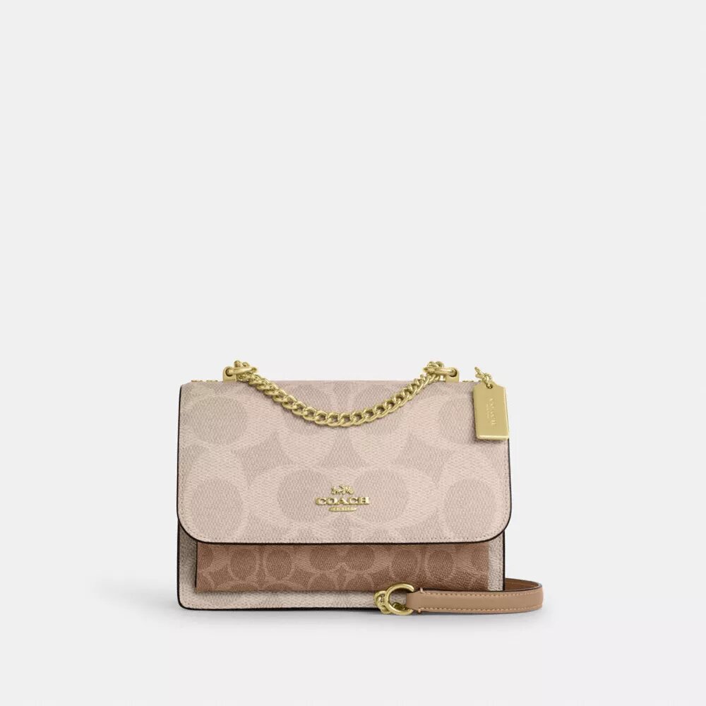 Klare crossbody-veske i blokkmønstret Signature Canvas