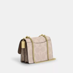 Klare crossbody-veske i blokkmønstret Signature Canvas
