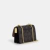 Klare crossbody-veske i blokkmønstret Signature Canvas