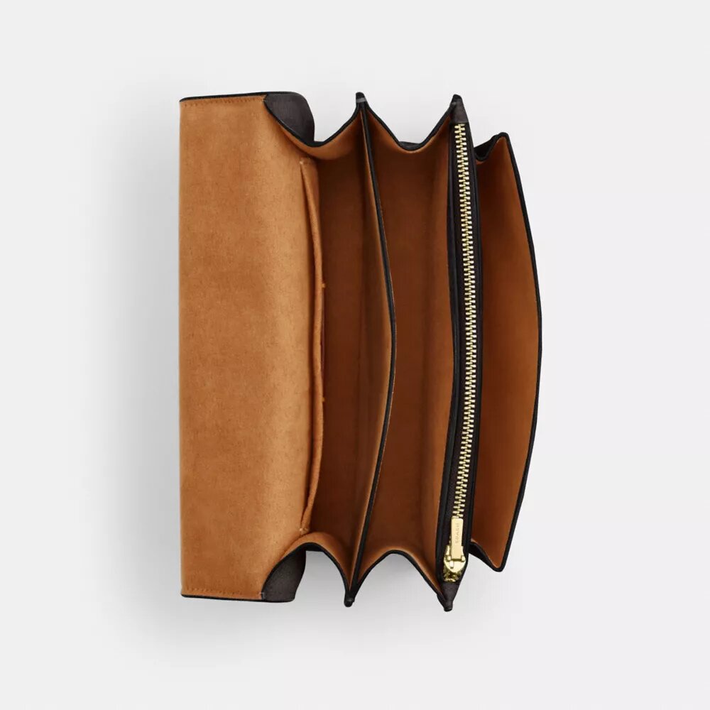 Klare crossbody-veske i blokkmønstret Signature Canvas
