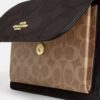Klare crossbody-veske i blokkmønstret Signature Canvas