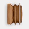 Klare-crossbody-veske i Signature Canvas med anheng
