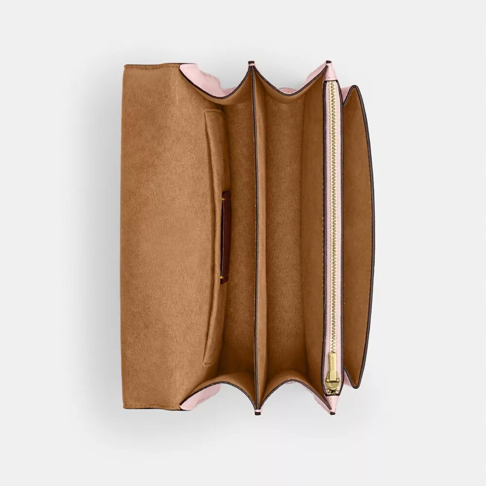 Klare-crossbody-veske i Signature Canvas med anheng