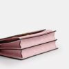 Klare-crossbody-veske i Signature Canvas med anheng