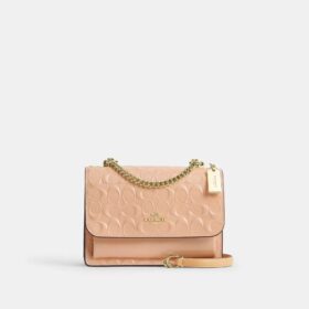 Klare-crossbody-veske i signaturlær