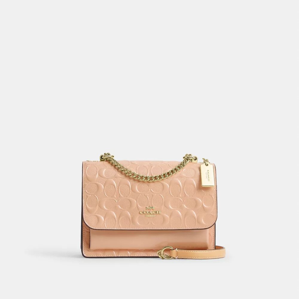 Klare-crossbody-veske i signaturlær
