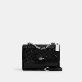 Klare-crossbody-veske i signaturlær
