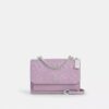 Klare-crossbody-veske i signaturlær