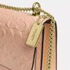Klare-crossbody-veske i signaturlær
