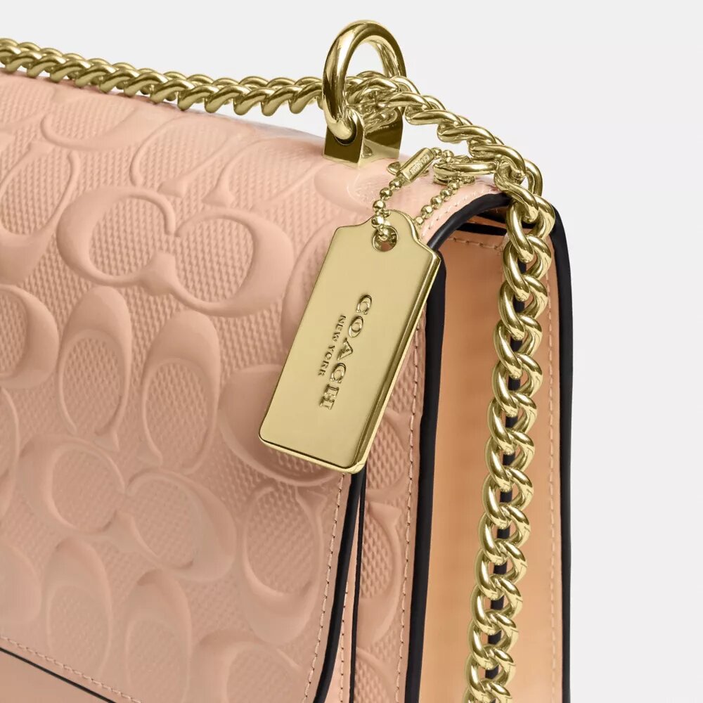 Klare-crossbody-veske i signaturlær
