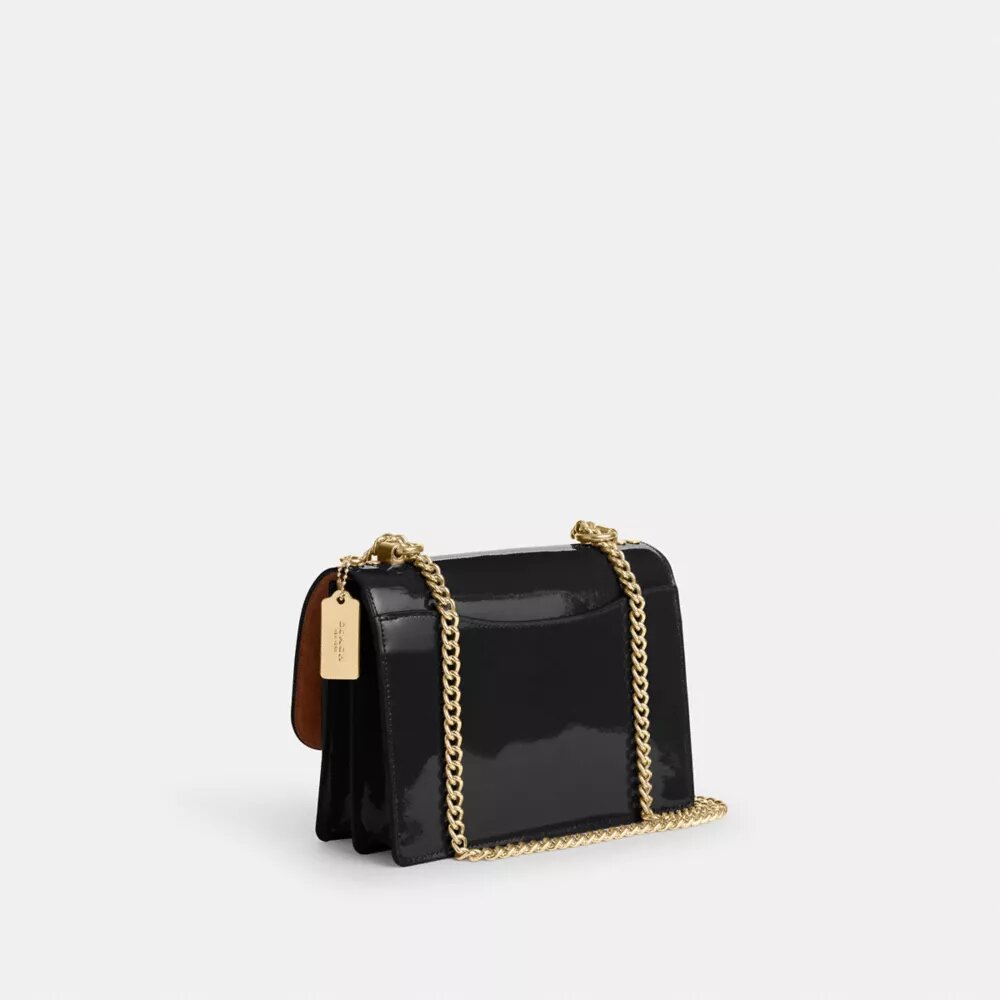 Klare-crossbody-veske i signaturlær