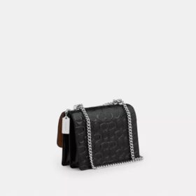 Klare-crossbody-veske i signaturlær