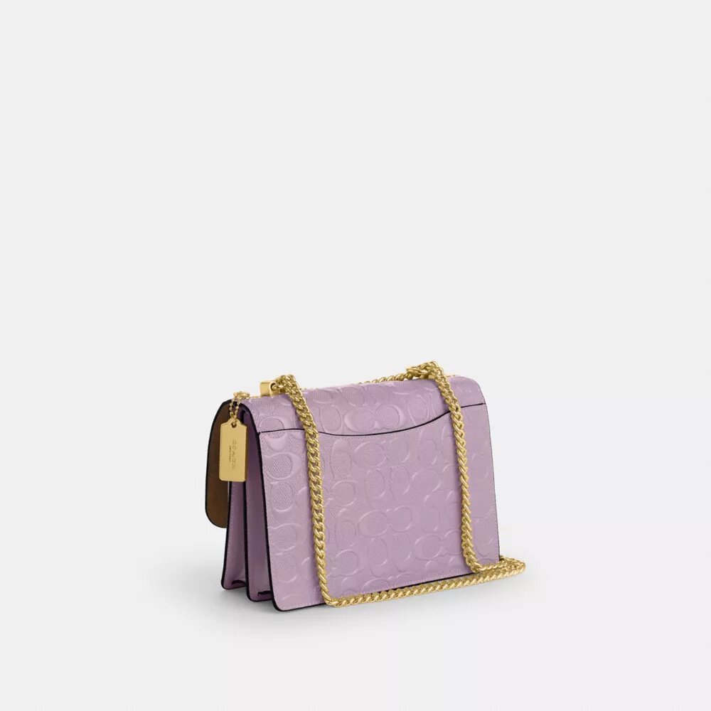 Klare-crossbody-veske i signaturlær