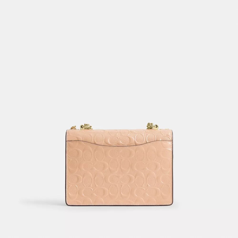 Klare-crossbody-veske i signaturlær