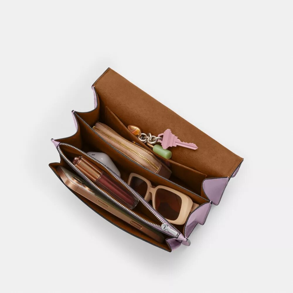 Klare-crossbody-veske i signaturlær