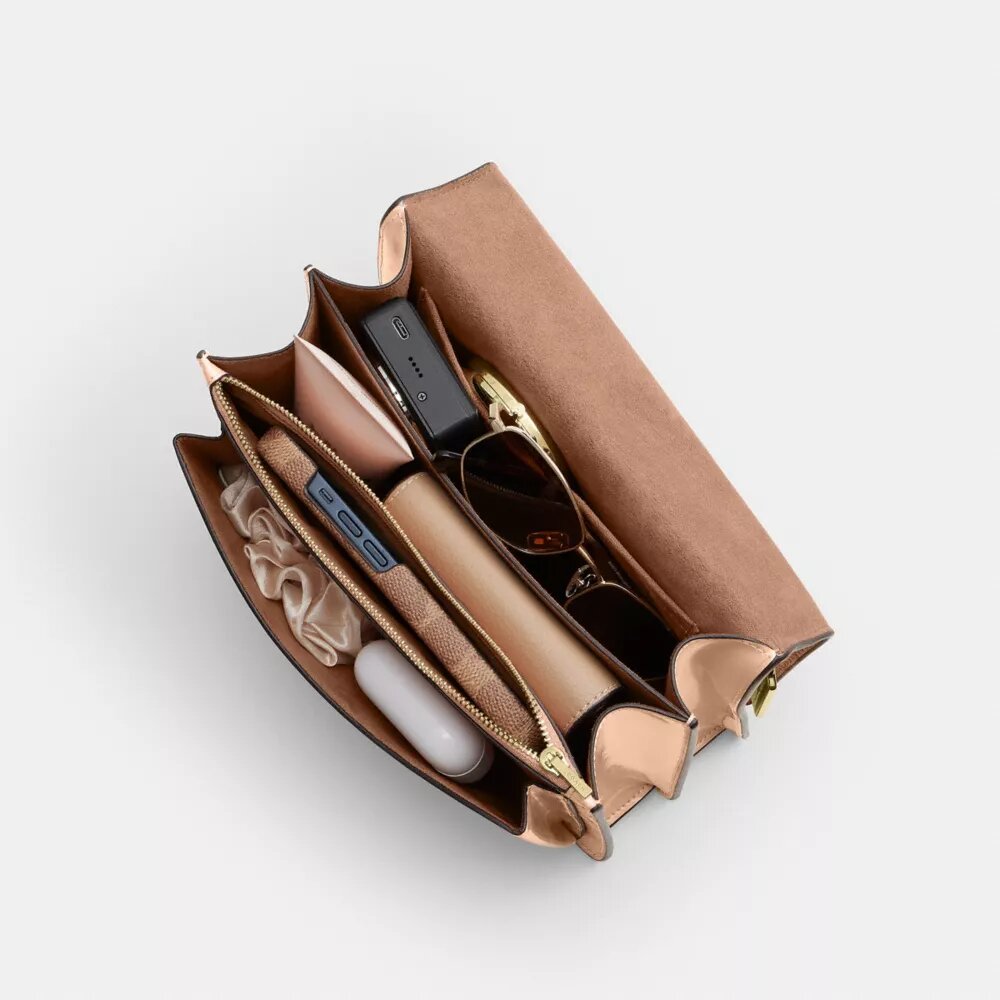 Klare-crossbody-veske i signaturlær