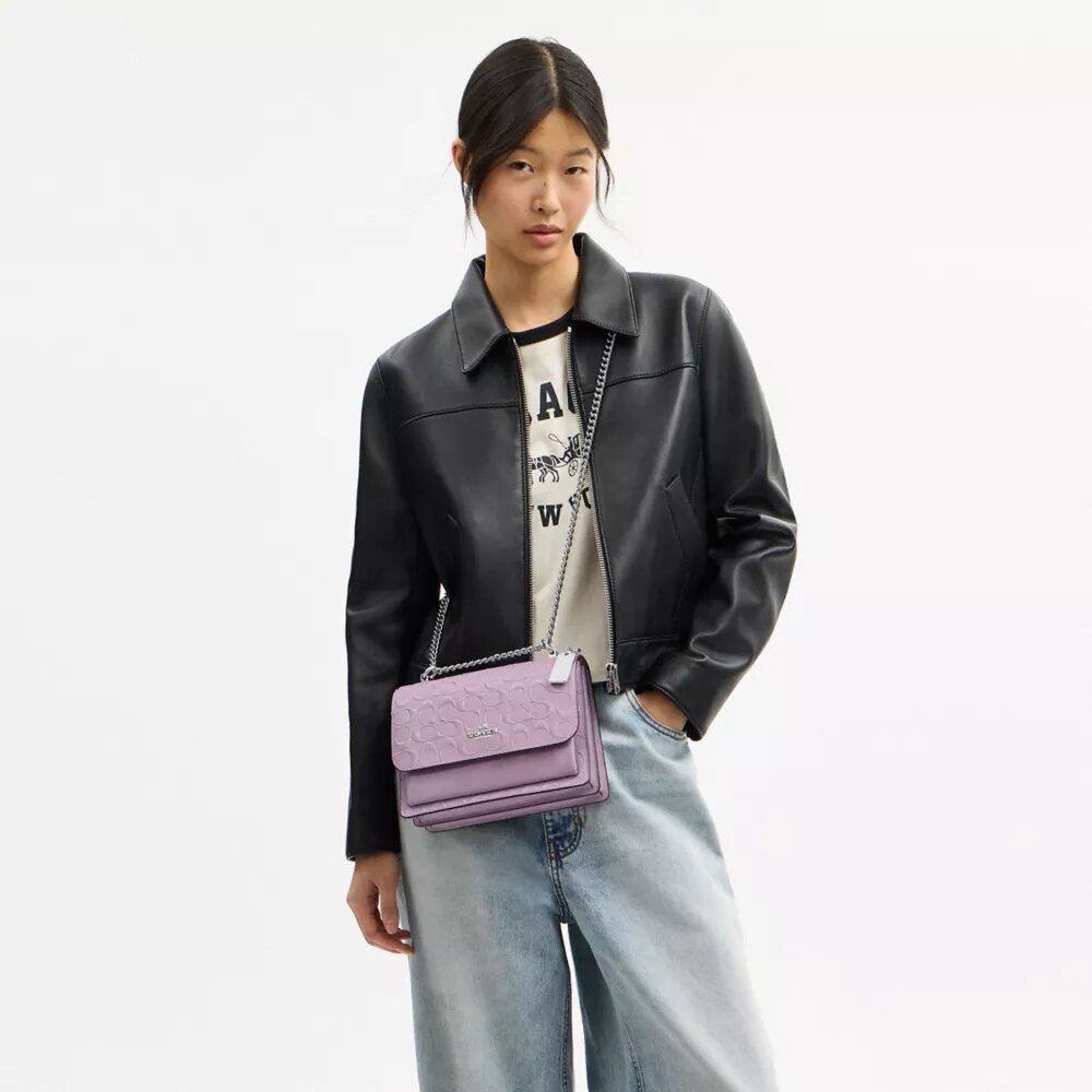 Klare-crossbody-veske i signaturlær