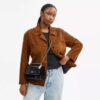Klare-crossbody-veske i signaturlær