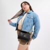 Klare-crossbody-veske i signaturlær