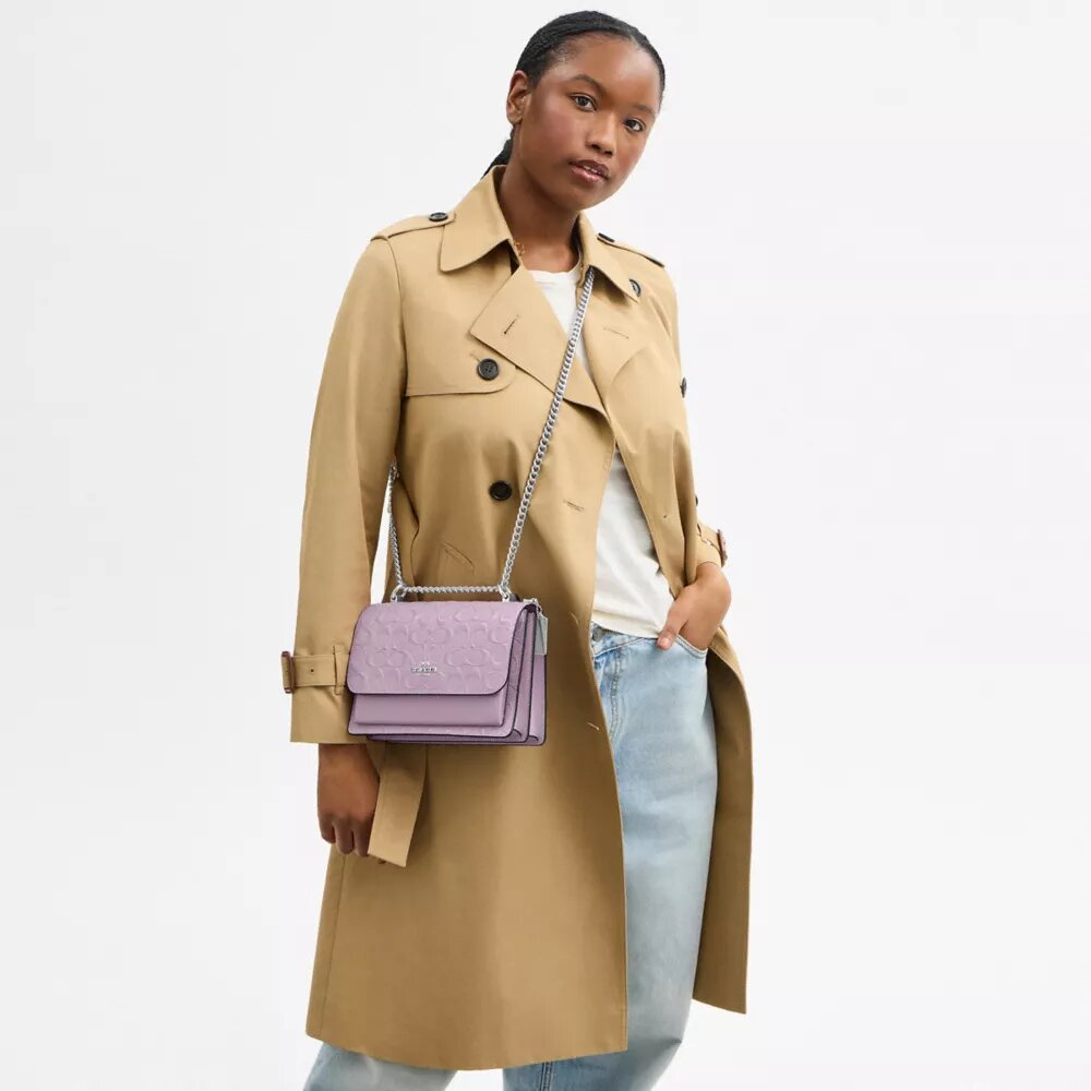Klare-crossbody-veske i signaturlær