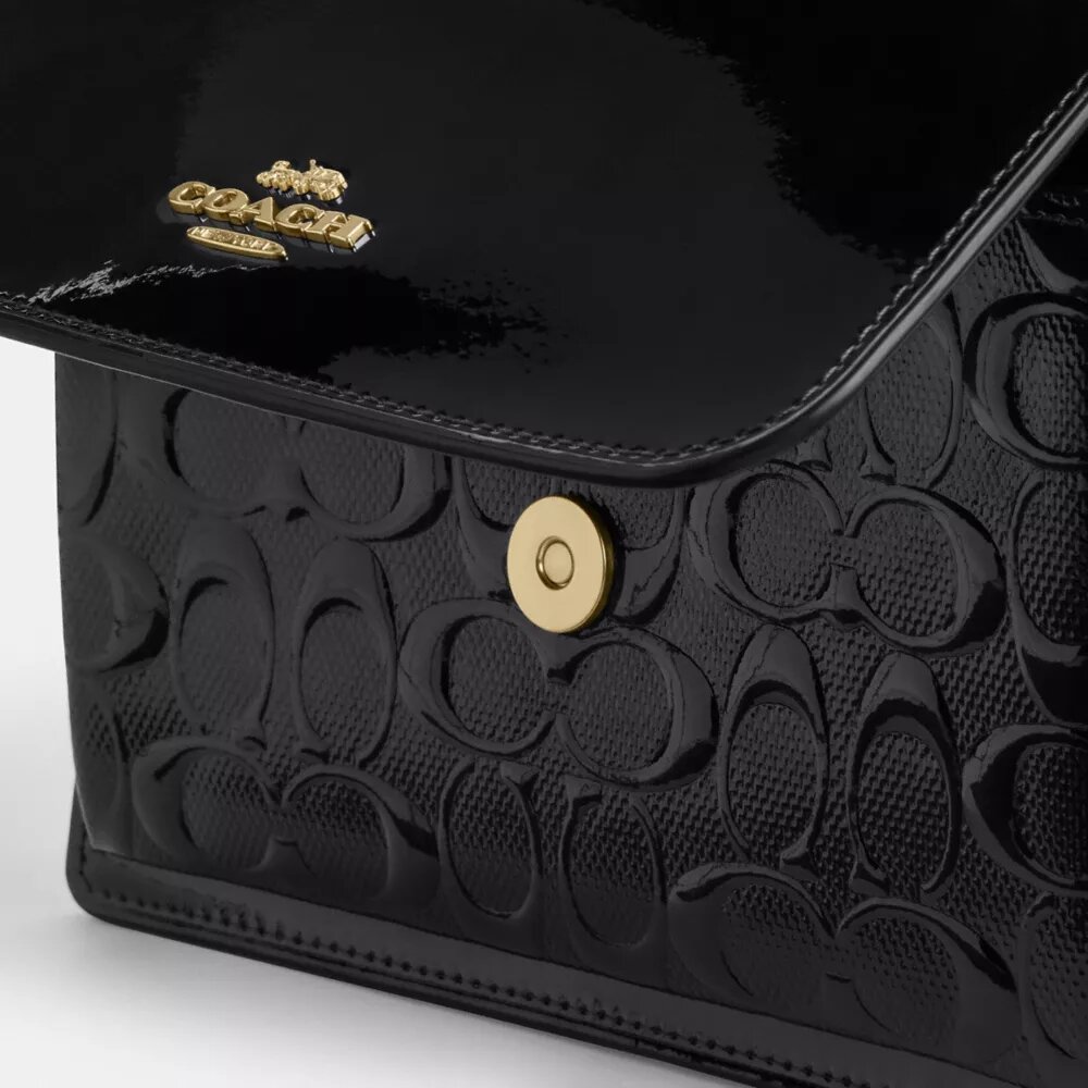Klare-crossbody-veske i signaturlær