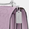 Klare-crossbody-veske i signaturlær