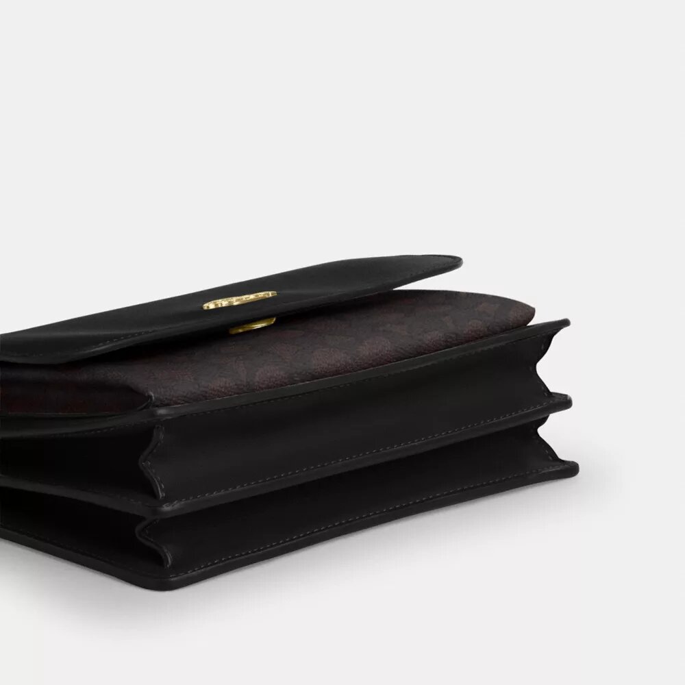 Klare-veske med kryssrem i Signature Canvas