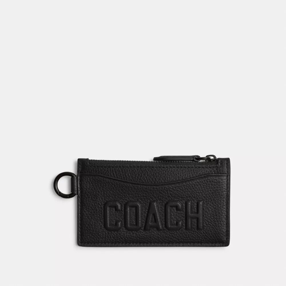 Kortetui med glidelås og Coach-grafikk
