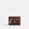 Kortholder med anheng