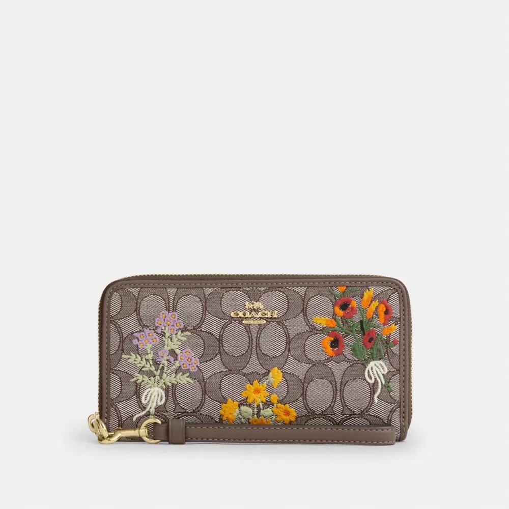Lang lommebok med glidelås rundt hele omkretsen i Signature-jacquard med blomsterbroderi