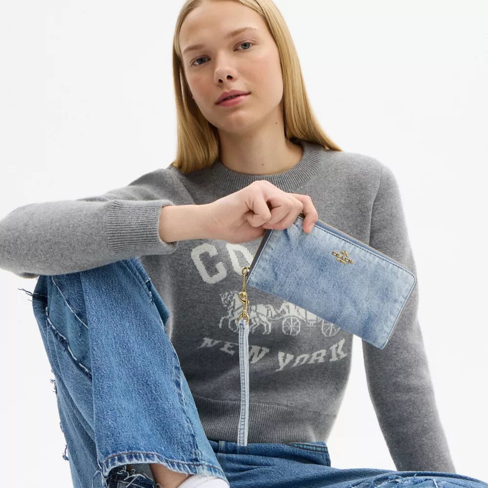 Lang lommebok med glidelås rundt i «Loved Denim»