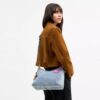 Laurel skulderveske i «Loved Denim» med anheng