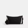 Liten Finn-crossbody-veske med kryssrem og lomme