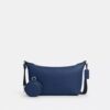 Liten Finn-crossbody-veske med kryssrem og lomme