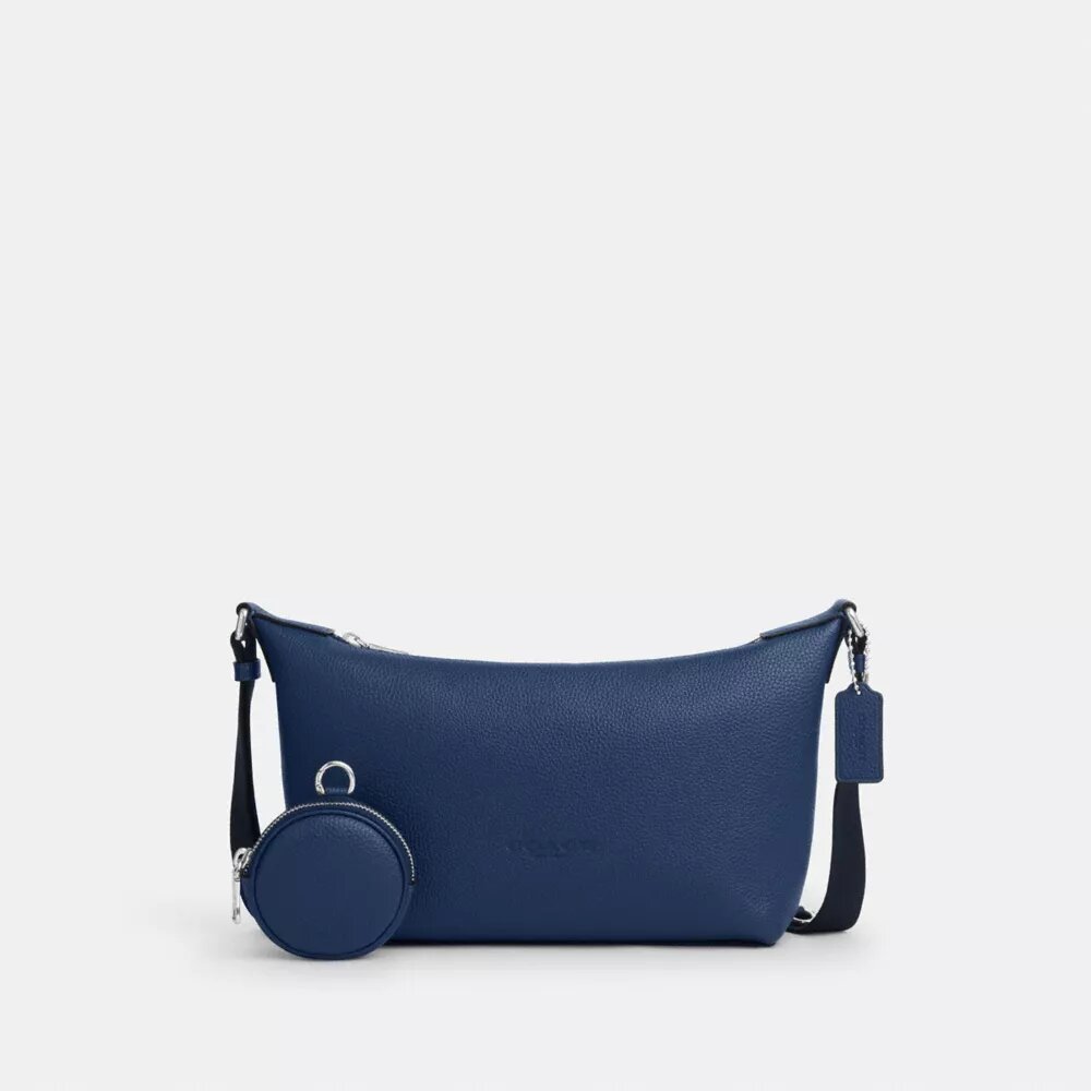 Liten Finn-crossbody-veske med kryssrem og lomme