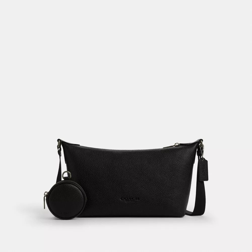 Liten Finn-crossbody-veske med kryssrem og lomme