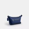 Liten Finn-crossbody-veske med kryssrem og lomme