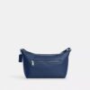 Liten Finn-crossbody-veske med kryssrem og lomme