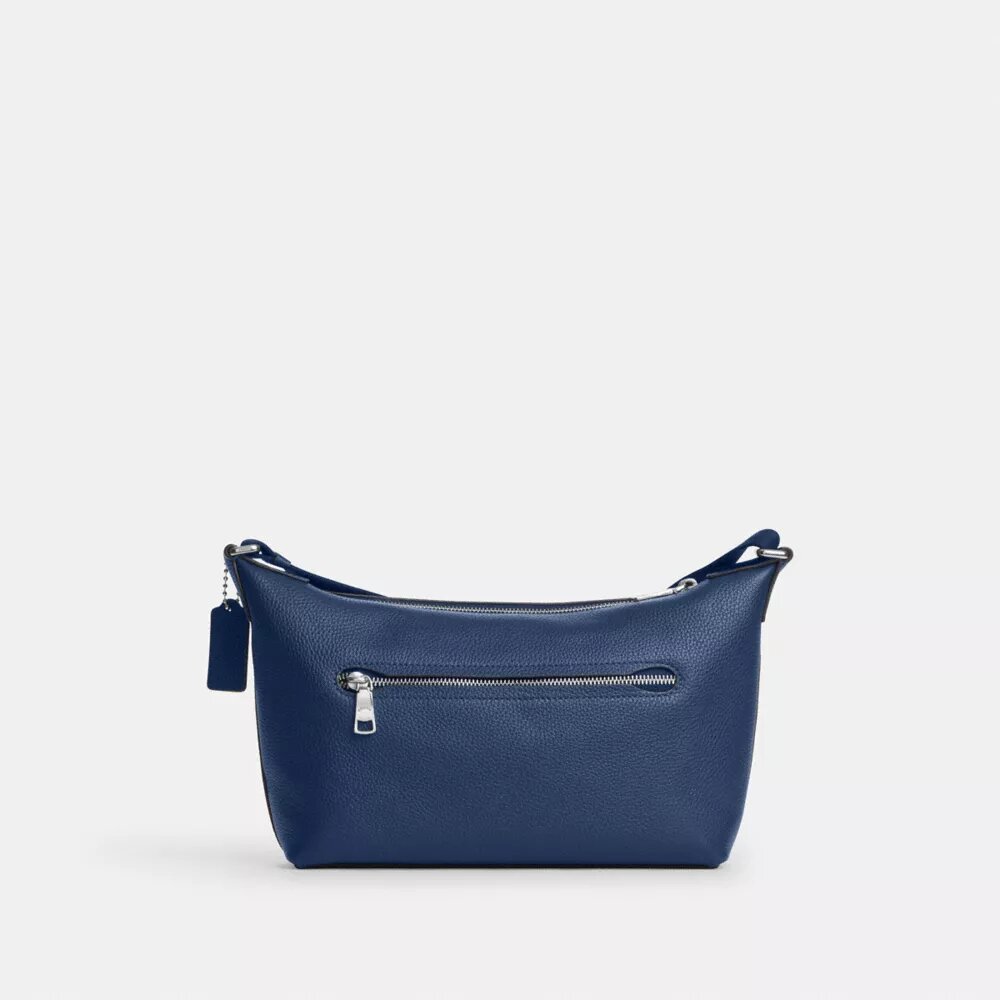 Liten Finn-crossbody-veske med kryssrem og lomme