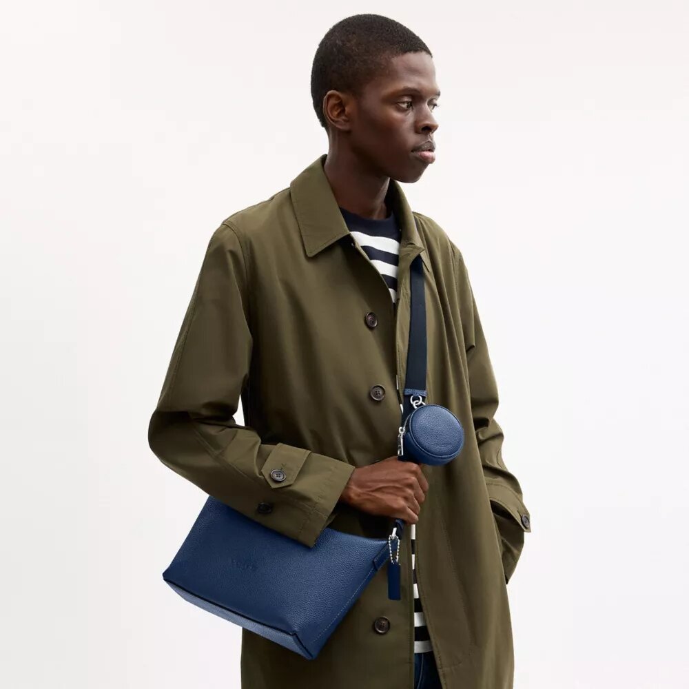 Liten Finn-crossbody-veske med kryssrem og lomme