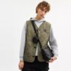 Liten Finn-crossbody-veske med kryssrem og lomme i Signature Canvas