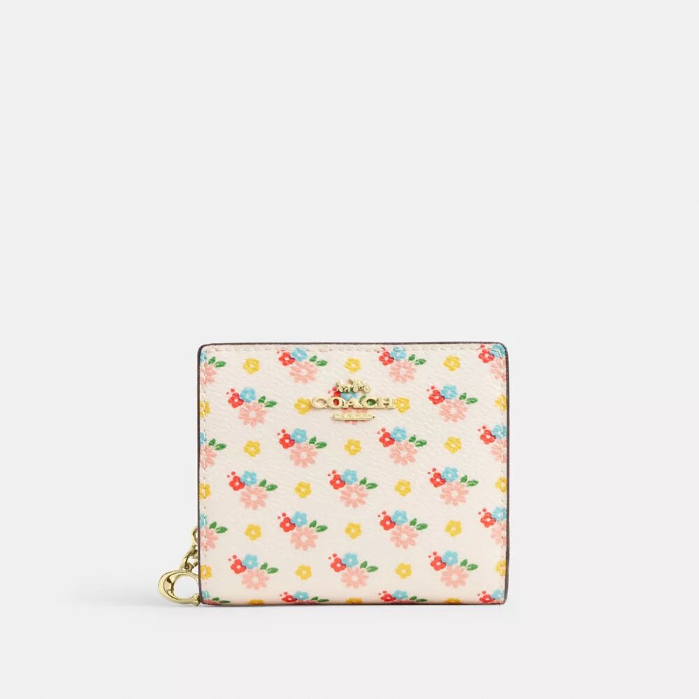 Lommebok med trykknapp, blomstermønster og anheng