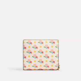 Lommebok med trykknapp, blomstermønster og anheng