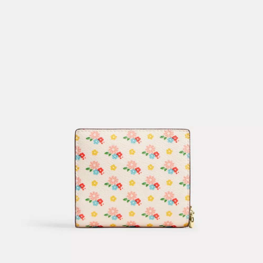 Lommebok med trykknapp, blomstermønster og anheng