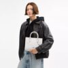 Maggie liten tote-veske i Signature Canvas