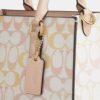 Maggie liten tote-veske i Signature Canvas