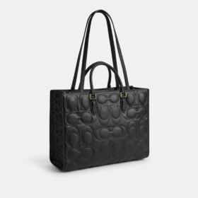 Maggie-tote-veske i signaturlær