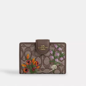 Mellomstor hjørnelommebok med glidelås i signatur-jacquard med blomsterbroderi